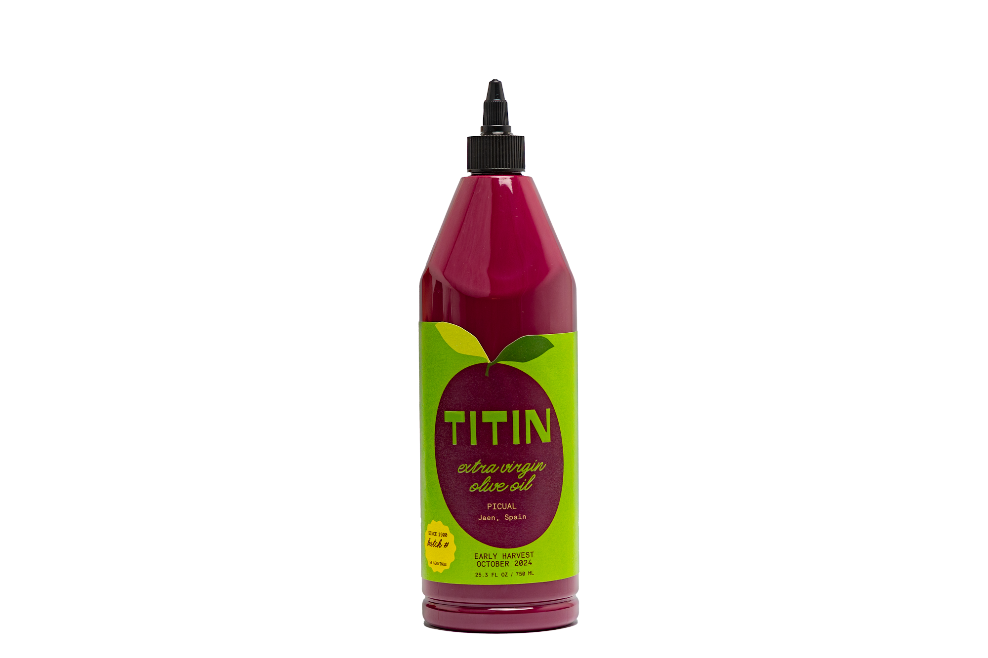 Premium Picual extra virgin olive oil in a clear glass bottle, perfect for finishing dishes.