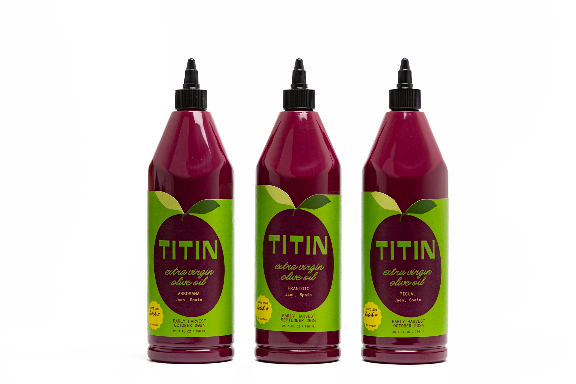 Three bottles of our Finishing extra virgin olive oil trio pack, featuring Picual, Frantoio, and Arbosana varieties, elegantly displayed.